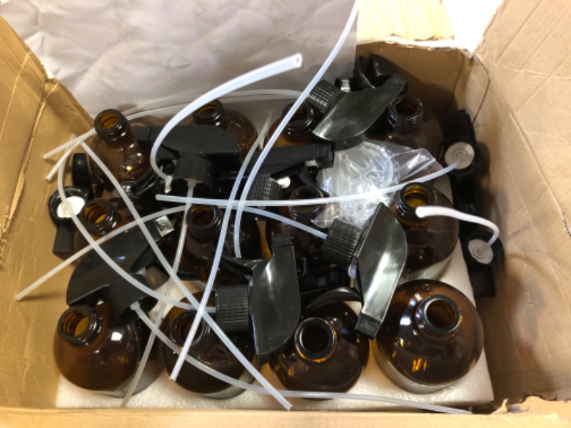 Photo 2 of 16 0z amber glass spray bottles 12pcs, (damages to box, items loose in box)