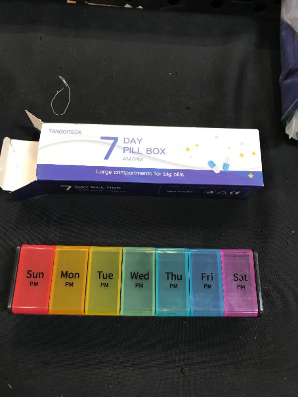 Photo 1 of 7 day pill box 