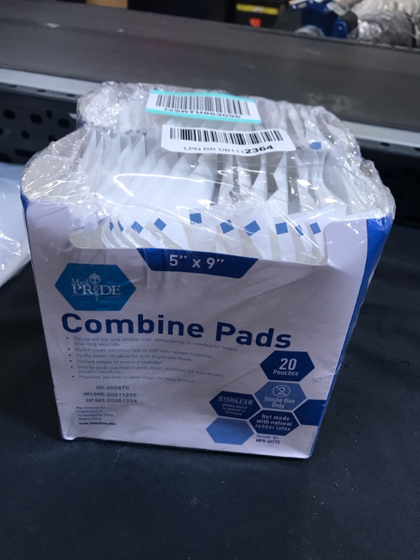 Photo 1 of 2 boxes of companied pads 