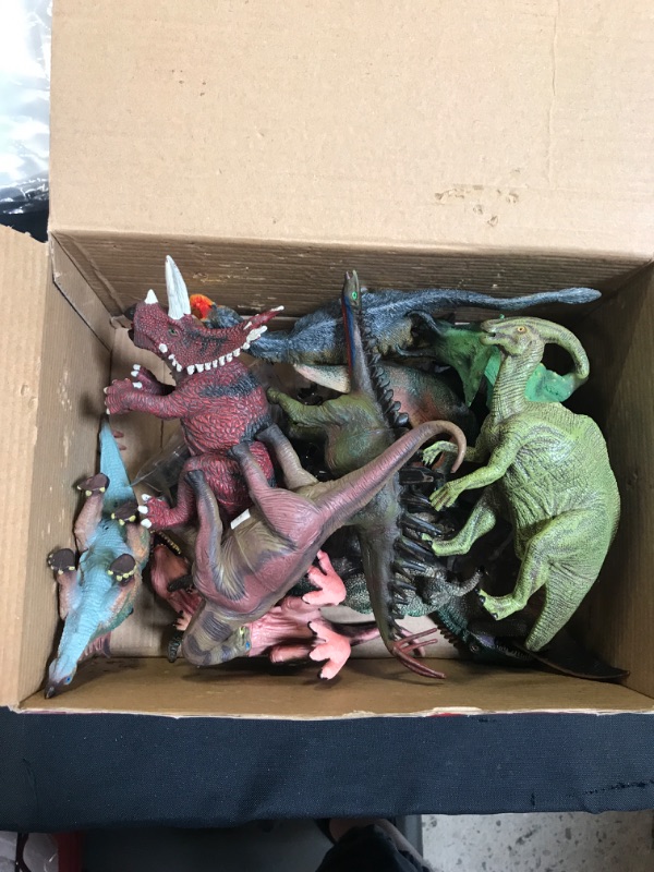Photo 1 of box of dinosaur toys 