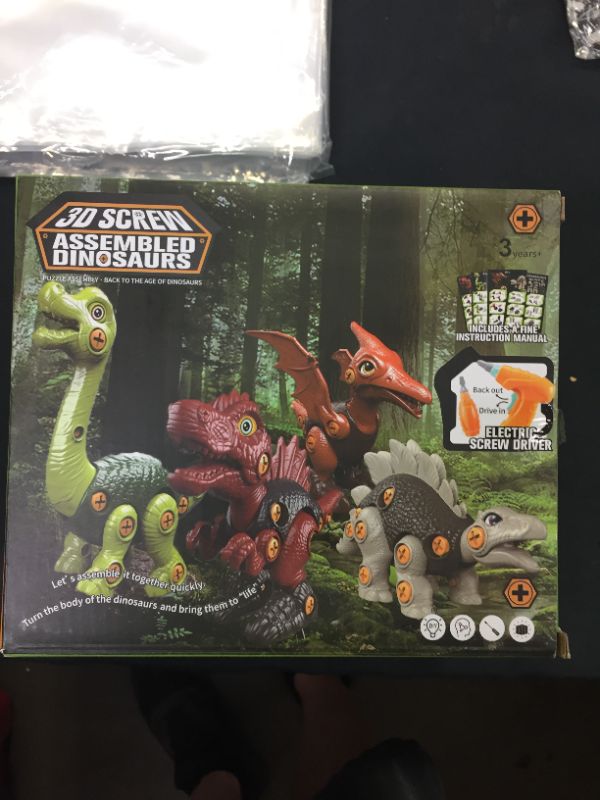 Photo 1 of dinosuar assembly toy 