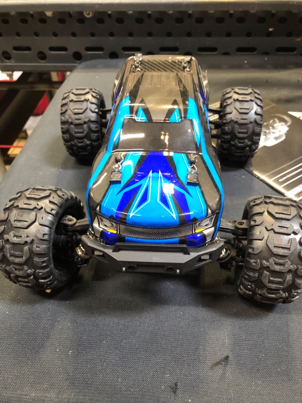 Photo 3 of PHYWESS RC Cars Remote Control Car for Boys 2.4 GHZ High Speed Racing Car, 1:16 RC Trucks 4x4 Offroad with Headlights, Electric Rock Crawler Toy Car Gift for Kids Adults Girls
