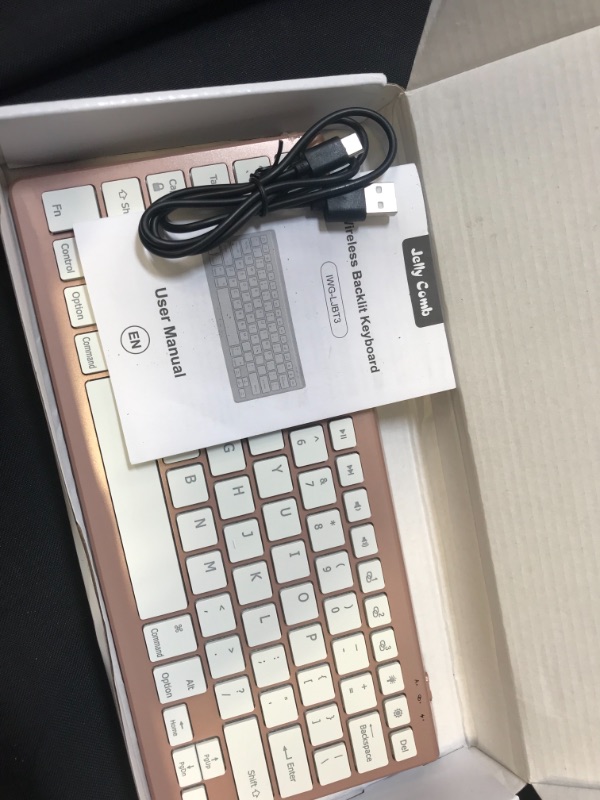 Photo 1 of BLUETOOTH RECHARGABLE tablet keyboard rose gold 