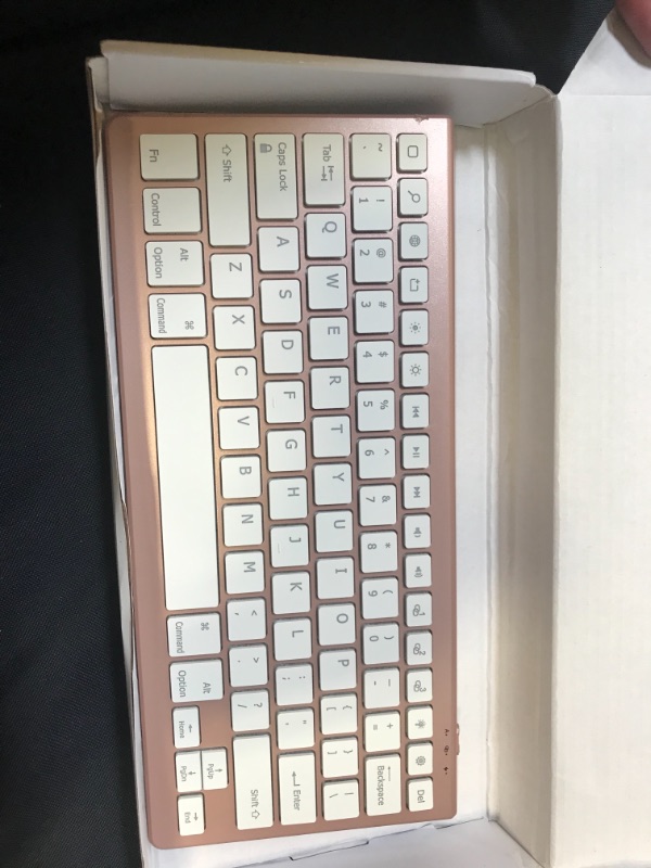 Photo 2 of BLUETOOTH RECHARGABLE tablet keyboard rose gold 