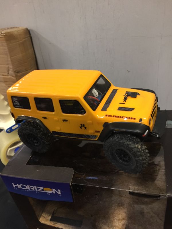 Photo 2 of Axial RC Truck 1/24 SCX24 2019 Jeep Wrangler JLU CRC 4WD Rock Crawler Brushed RTR, Yellow, AXI00002V2T2
