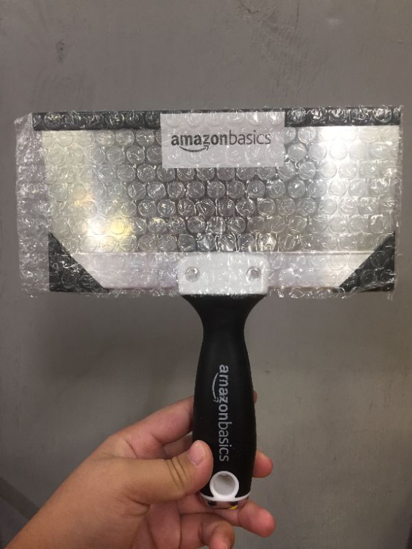 Photo 2 of Amazon Basics 8" Soft Grip, Stainless Steel Tape Knife with Hammer End
