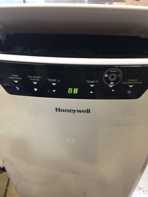 Photo 3 of Honeywell Classic Portable Air Conditioner with Dehumidifier & Fan, Cools Rooms Up to 700 Sq. Ft. with Drain Pan & Insulation Tape, MN4CFSWW9 (White), 29.400
