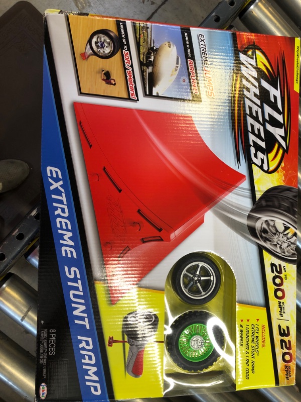 Photo 1 of Fly Wheels Ramp with Launcher + 2 Wheels - Rip it up to 200 Scale MPH, Fast Speed, Amazing Stunts & Jumps up to 30 feet! All Terrain Action: Dirt, Mud, Water, Snow- One of The Hottest Wheels Around!
