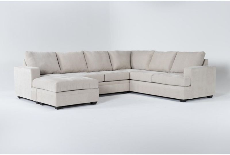 Photo 1 of BEIGE SECTIONAL COUCH 
(3 BOXES MISSING A SECTION)