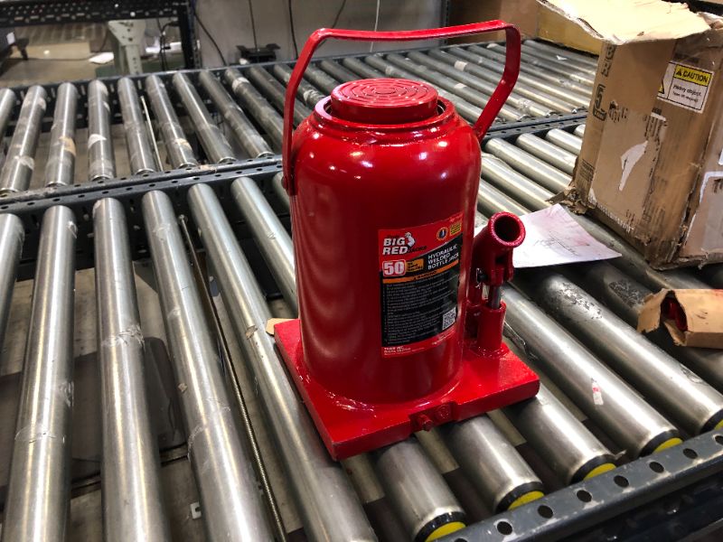 Photo 2 of BIG RED T95007 Torin Hydraulic Stubby Low Profile Welded Bottle Jack, 50 Ton (100,000 lb) Capacity, Red