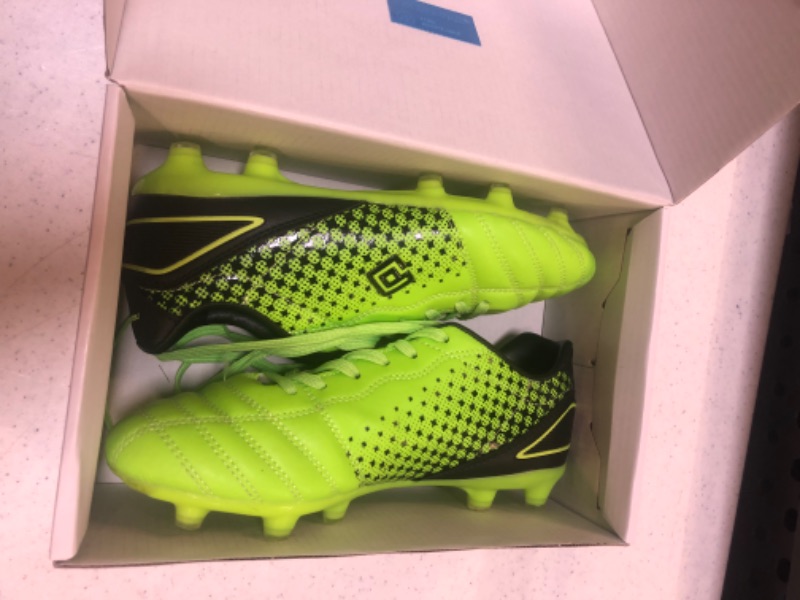 Photo 1 of kids soccer cleats neon green size 4  