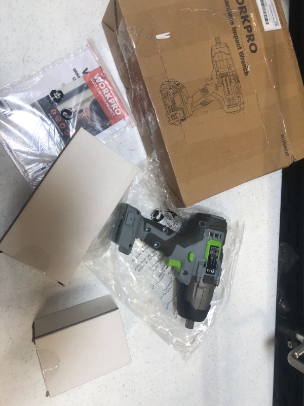 Photo 1 of WORKPRO 20V Cordless Impact Wrench, 1/2-inch, 320 Ft Pounds Max Torque, 2.0Ah Li-ion Battery with Fast Charger, Belt Clip for Easy Carrying
