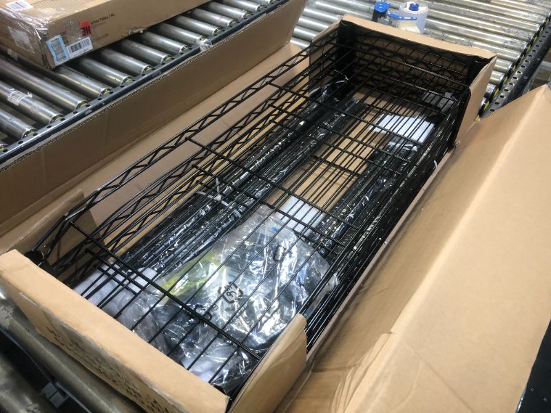 Photo 1 of Amazon Basics 4-Shelf Adjustable, Heavy Duty Storage Shelving Unit (350 lbs loading capacity per shelf), Steel Organizer Wire Rack, Black (36L x 14W x 54H)