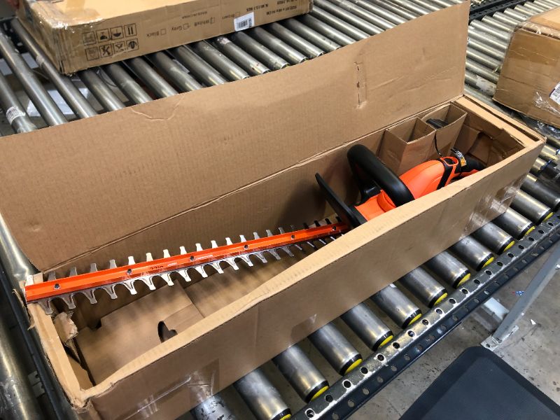 Photo 1 of BLACK+DECKER 20V MAX* Cordless Hedge Trimmer, 22-Inch (LHT2220),Orange & 20V MAX* Lithium Battery (LBXR20)
