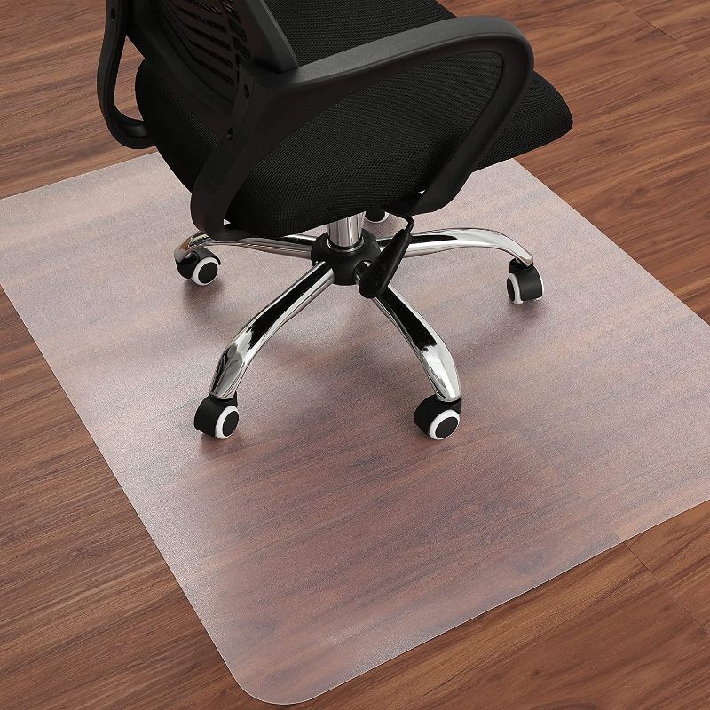 Photo 1 of Desk Chair Mat for Tile and Hardwood Floor, Floor Protector for Under Rolling Office Chair and Computer Table, Large 47 x 35 Inches, Semi-Clear Plastic, and Non-Slip, Non-Curve Mat, Not for Carpet