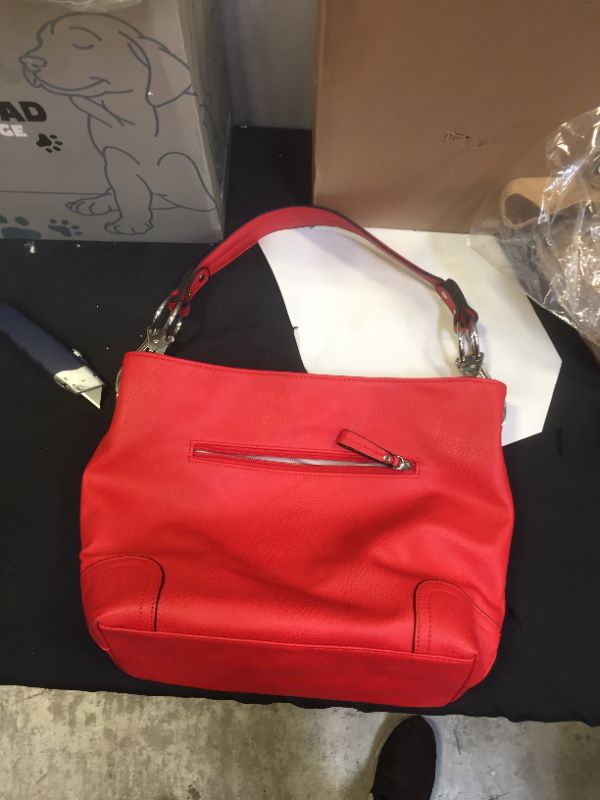 Photo 1 of Generic red faux leather purse 