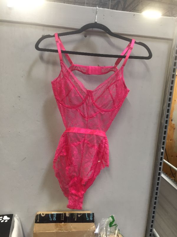 Photo 1 of Pink lingerie, tag reads medium but runs small 