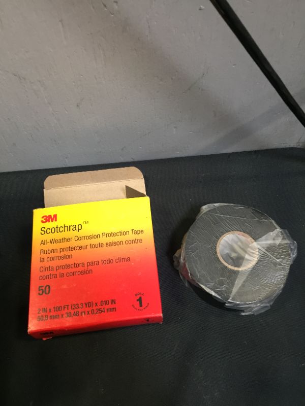 Photo 2 of 3M 50-UNPRINTED-2X100FT-BOX Premium Grade All-Weather Corrosion Protection Tape 2 Inch x 100 ft x 10 mil Vinyl Backing Black Scotchrap
