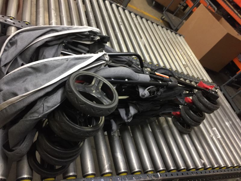 Photo 1 of Dream On Me Volgo Twin Umbrella Stroller, Dark and Light Grey. Moderate Use, Box Packaging Damaged, Scratches and Scuffs on item From Previous Use