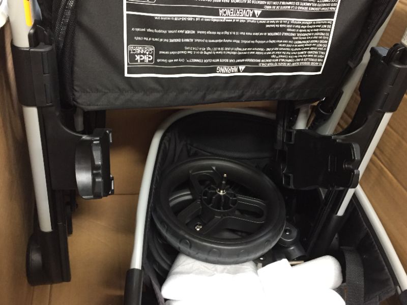 Photo 9 of OMNI PLUS MODULAR TRAVEL SYSTEM WITH LITEMAX SPORT REAR-FACING INFANT CAR SEAT. Box Packaging Badly Damaged, Moderate Use, May be Missing Parts, Scratches and Scuffs on item. Wear on Wheels.  Minor Stains found on item, Dirty from Previous Use. 