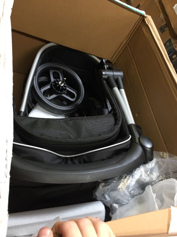 Photo 4 of OMNI PLUS MODULAR TRAVEL SYSTEM WITH LITEMAX SPORT REAR-FACING INFANT CAR SEAT. Box Packaging Badly Damaged, Moderate Use, May be Missing Parts, Scratches and Scuffs on item. Wear on Wheels.  Minor Stains found on item, Dirty from Previous Use. 