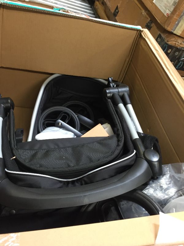 Photo 3 of OMNI PLUS MODULAR TRAVEL SYSTEM WITH LITEMAX SPORT REAR-FACING INFANT CAR SEAT. Box Packaging Badly Damaged, Moderate Use, May be Missing Parts, Scratches and Scuffs on item. Wear on Wheels.  Minor Stains found on item, Dirty from Previous Use. 