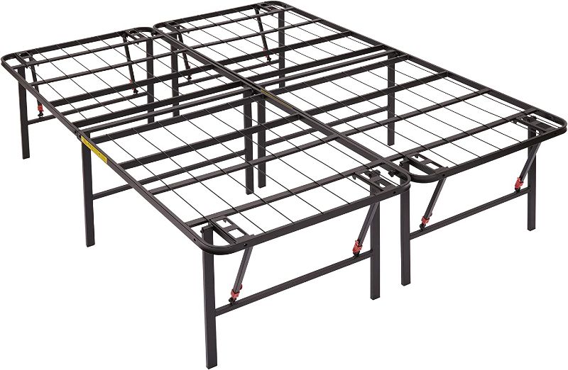 Photo 1 of Amazon Basics Foldable Metal Platform Bed Frame with Tool Free Setup, 18 Inches High, Queen, Black Box Packaging Damage, Item is New.
