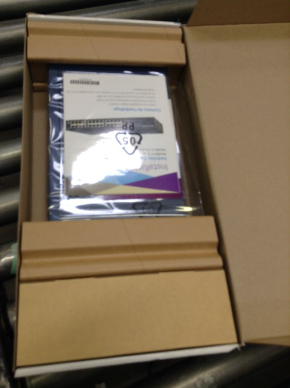 Photo 4 of  NETGEAR 24-Port Gigabit Ethernet Unmanaged Switch (JGS524) Box Packaging Slightly Damaged, Item is New