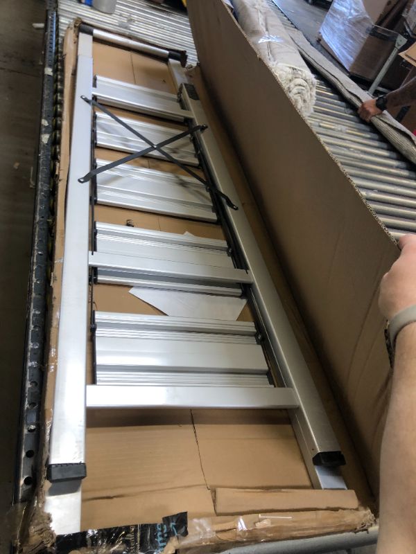 Photo 3 of 5 Steps Lightweight Aluminum Ladder Folding Step Stool Stepladders with Anti-Slip and Wide Pedal for Home and Kitchen Use Space Saving (Silver) Box Packaging Badly Damaged, Moderate Use, Scratches and SCuffs on item, Missing Bottom Foot Pads. 
