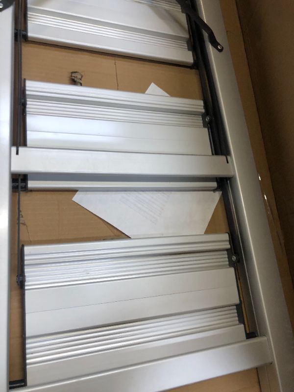 Photo 4 of 5 Steps Lightweight Aluminum Ladder Folding Step Stool Stepladders with Anti-Slip and Wide Pedal for Home and Kitchen Use Space Saving (Silver) Box Packaging Badly Damaged, Moderate Use, Scratches and SCuffs on item, Missing Bottom Foot Pads. 
