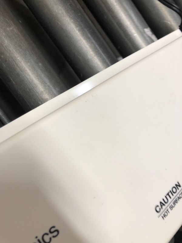 Photo 1 of Amazon Basics 12-Inch Thermal Laminator Machine. Moderate Use, Scratches and scuffs on item, Item Turns on.  Box Packaging Badly Damaged, 
