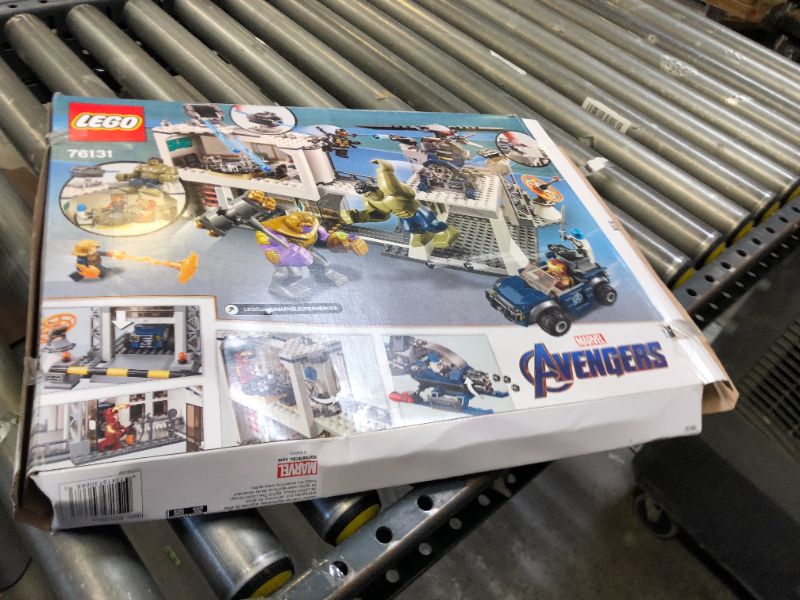 Photo 2 of LEGO Marvel Avengers Compound Battle 76131 Building Set Includes Toy Car, Helicopter, and Popular Avengers Characters Iron Man, Thanos and More (699 Pieces) - Missing Pieces, Remaining Bags Are Sealed. Box Packaging Damaged.
