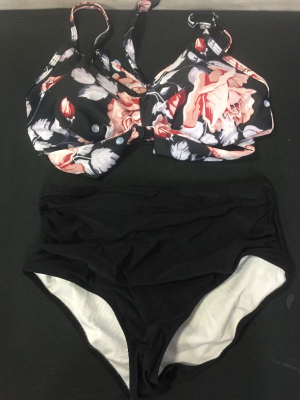 Photo 1 of BLACK AND FLORAL BIKINI 2 PIECE SET -- SOLD AS IS