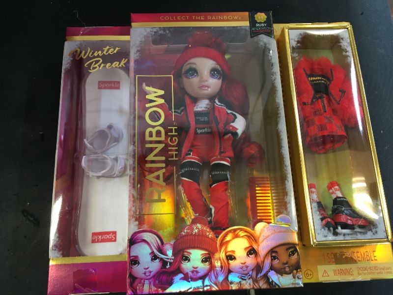 Photo 4 of Rainbow High Winter Break Ruby Anderson – Red Fashion Doll and Playset with 2 Designer Outfits, Snowboard and Accessories
(factory sealed)