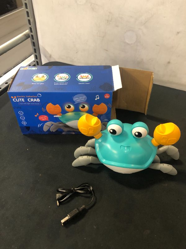 Photo 2 of Baby Crawling Crab Baby Toy, Sensor Obstacle Avoidance Function Electronic Pet Crab Crawling Toys, Build in USB Rechargeable, Baby Toy with Music and LED Light Up Dancing Crab Toy (Blue)
