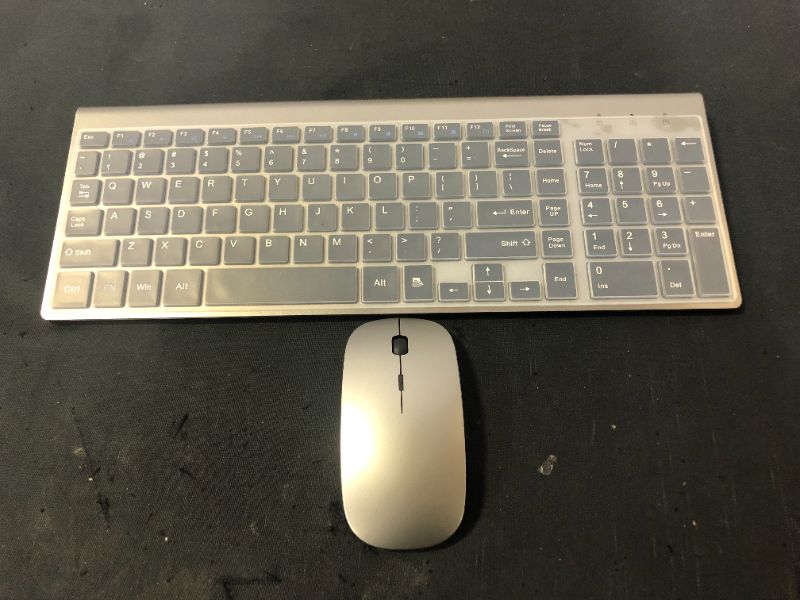Photo 1 of Wireless Keyboard and Mouse Ultra Slim Combo, TopMate 2.4G Silent Compact USB Mouse and Scissor Switch Keyboard Set with Cover, 2 AA and 2 AAA Batteries, for PC/Laptop/Windows/Mac - Gray Black
