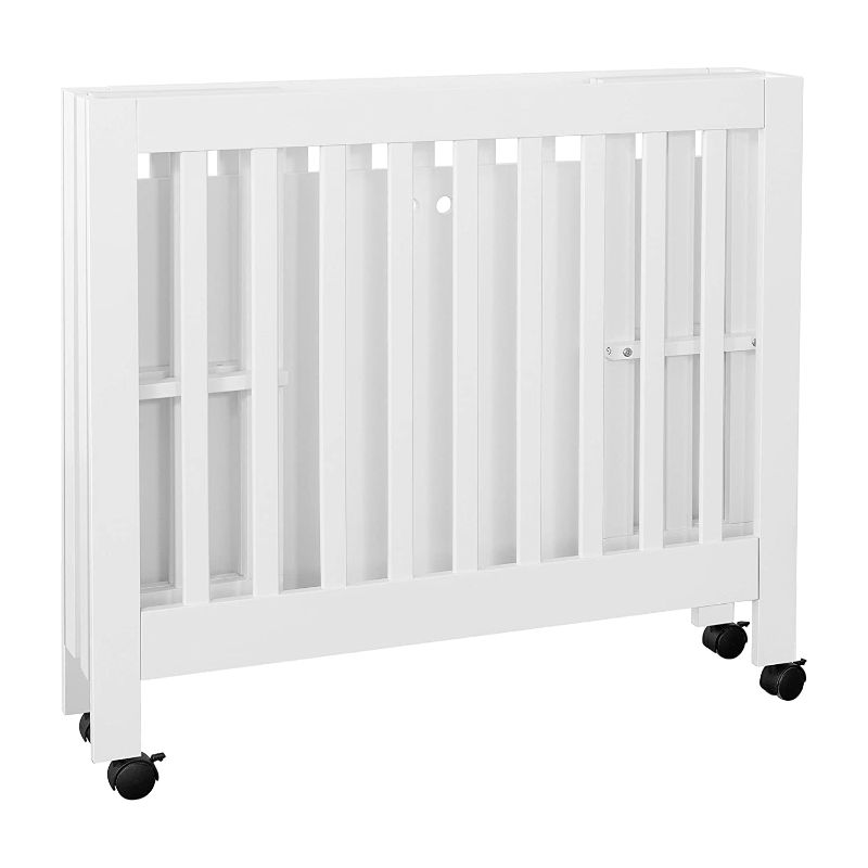 Photo 1 of Babyletto Origami Mini Portable Crib Folding with Wheels in White, 2 Adjustable Mattress Positions, Greenguard Gold Certified --some hardware missing--