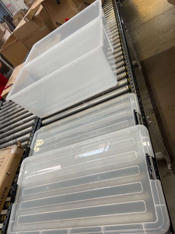 Photo 1 of 2 LARGE CLEAR BINS, UNKNOWN QT SIZE, DIMENSIONS ARE 31X12X17