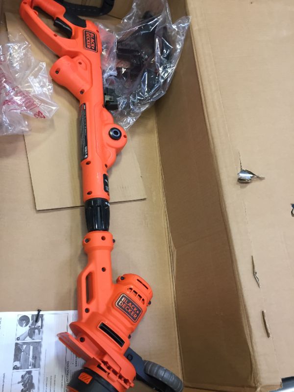 Photo 1 of BLACK+DECKER Electric Lawn Mower with Trimmer Line Cap and Spring for AFS Trimmer (BESTA512CM & RC-100-P)
(UNABLE TO TEST FUNCTIONALITY