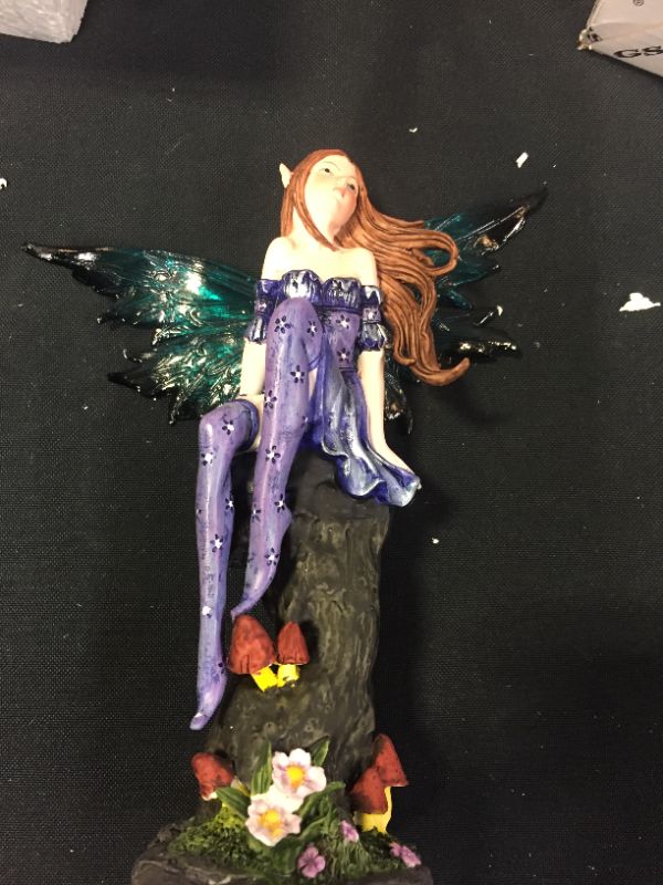 Photo 2 of Aint it Nice Aint It Nice - Purple Fairy Figurine with Clear Wings and Patterned Socks Enjoying Nature Surrounded by Flowers - Fairy Collection - Fantasy Decor - 8" x 6" x 2.8"
