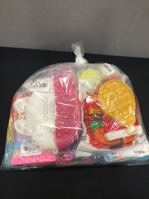 Photo 1 of FINAL SALE-- MISCELLANEOUS PUSH POP FIDGET TOYS SOLD AS IS