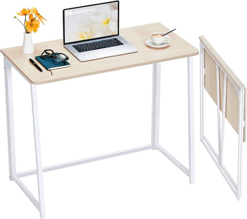 Photo 1 of WOHOMO Folding Desk, Small Foldable Desk 31.5" for Small Spaces, Space Saving Computer Table Writing Workstation for Home Office, Easy Assembly, Oak