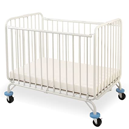 Photo 1 of L.A. Baby Deluxe Holiday Mini/Portable Folding Metal Crib, White
