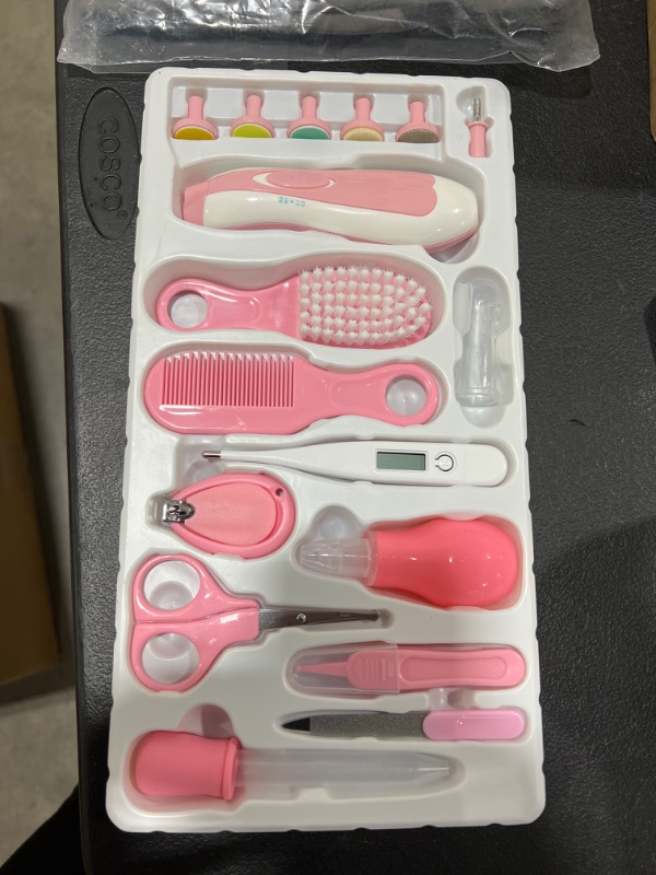 Photo 2 of OTTOLIVES Baby Healthcare and Grooming Kit, 24 in 1 Baby Electric Nail Trimmer Set Newborn Nursery Health Care Set for Newborn Infant Toddlers Baby Boys Girls Kids Haircut Tools (0-3 Years+) (Pink)
