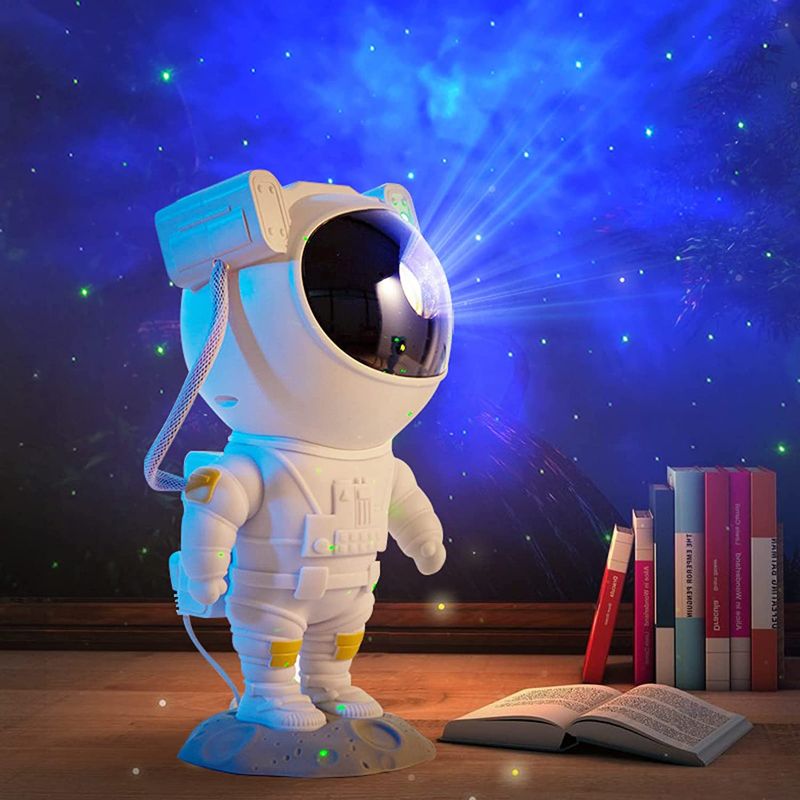 Photo 1 of Galaxy Projector for Kid Present, Astronaut Starry Nebula with Timer and Remote, Nebula Stars Projector Night Light Suitable for Gaming Room