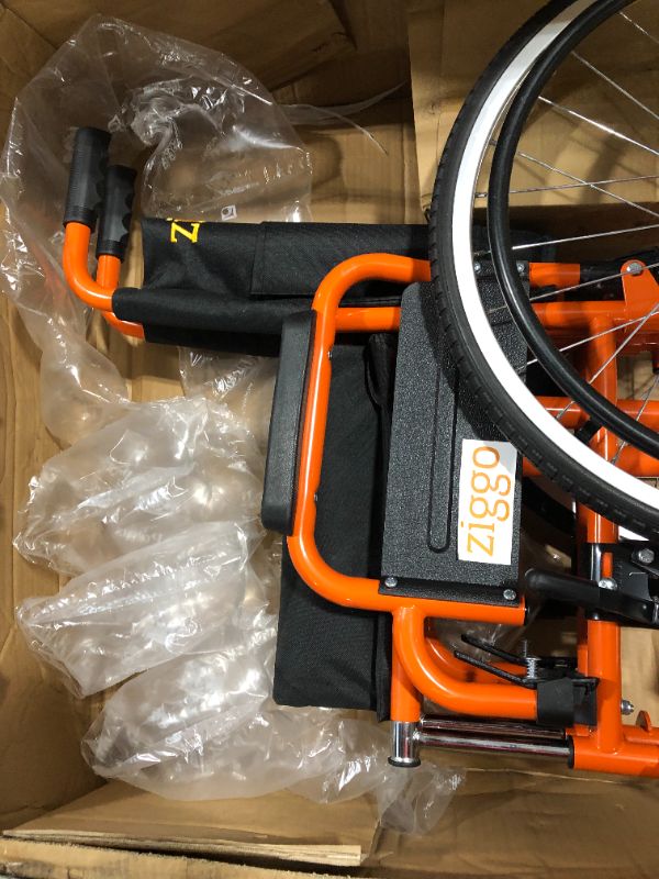 Photo 3 of Ziggo Pediatric Manual Wheelchair 14" Wide Seat Lightweight ZG1400 SwingAway (Orange)