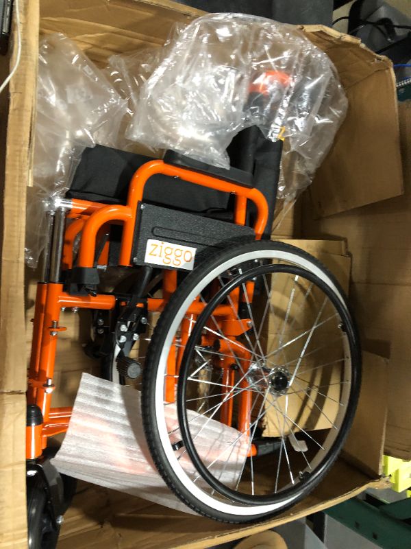Photo 2 of Ziggo Pediatric Manual Wheelchair 14" Wide Seat Lightweight ZG1400 SwingAway (Orange)