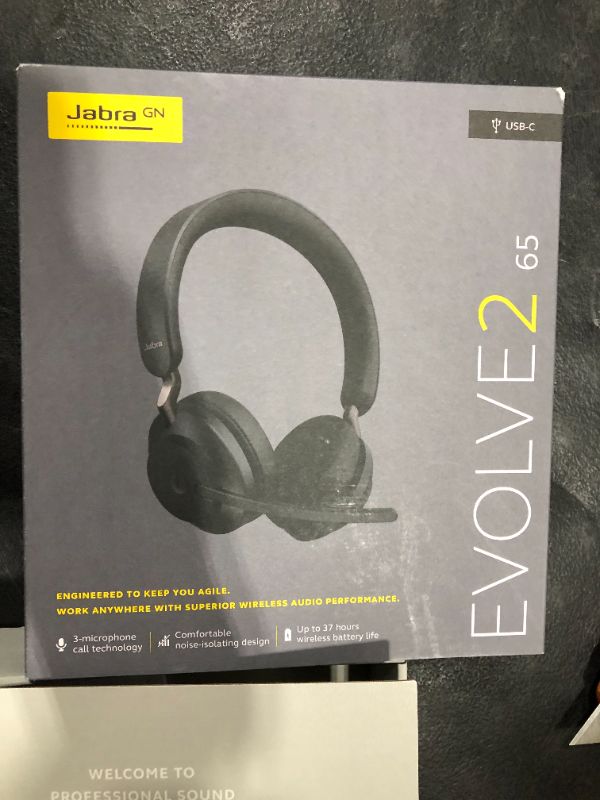 Photo 2 of Jabra Evolve2 65 UC Wireless Headphones with Link380a, Stereo, Black – Wireless Bluetooth Headset for Calls and Music, 37 Hours of Battery Life, Passive Noise Cancelling Headphones
