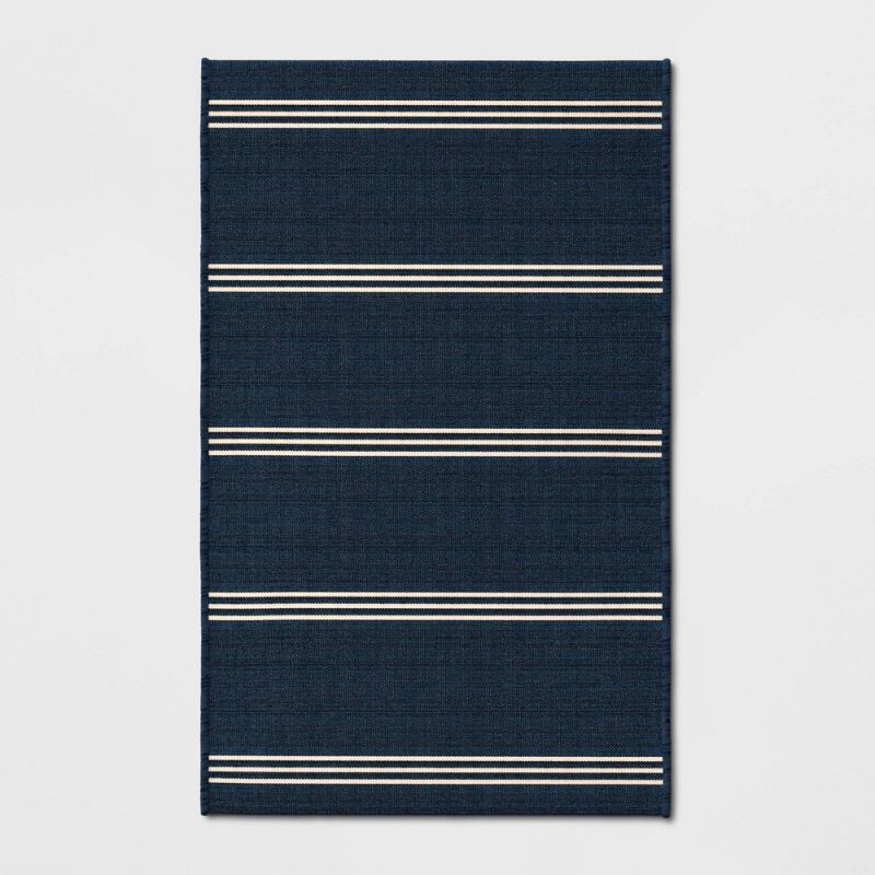 Photo 1 of 2'6" X 4'2" Stripe Outdoor Rug Navy - Threshold™
