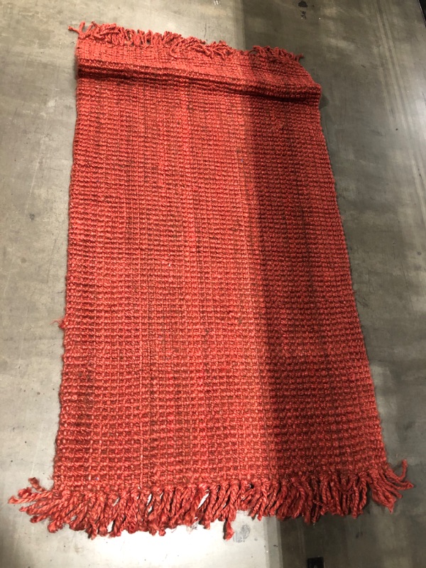 Photo 1 of 67 x 35 inch red woven rug